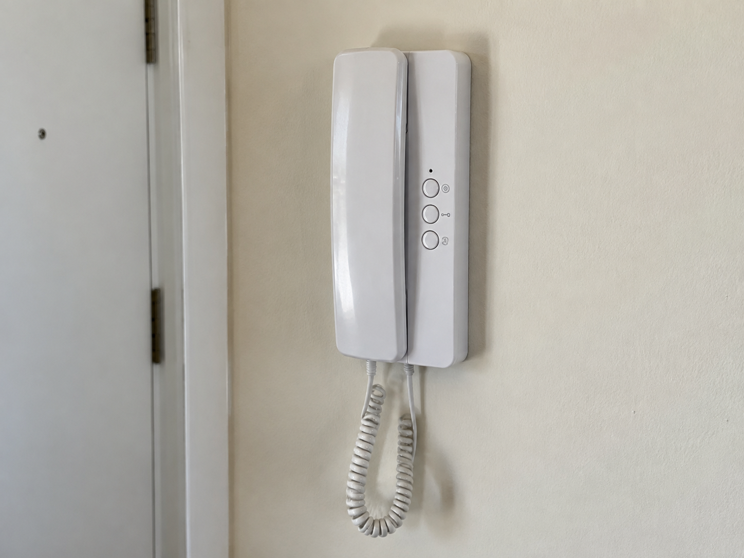 Telefonillo blanco en buen estado